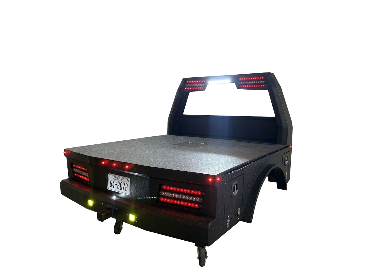 Heavy-gauge steel flatbed with stake pockets and toolboxes